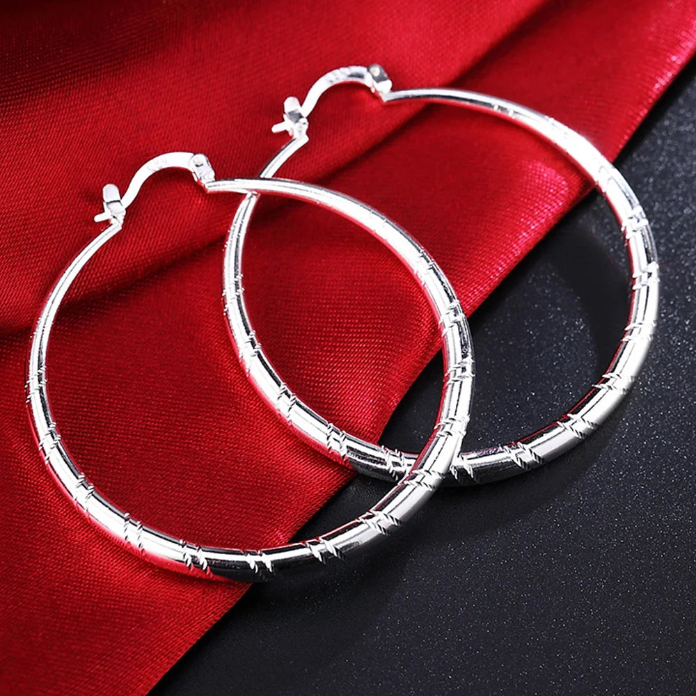 Engraved Sterling Silver Hoop Earrings – Polished Oval Hoops for Women