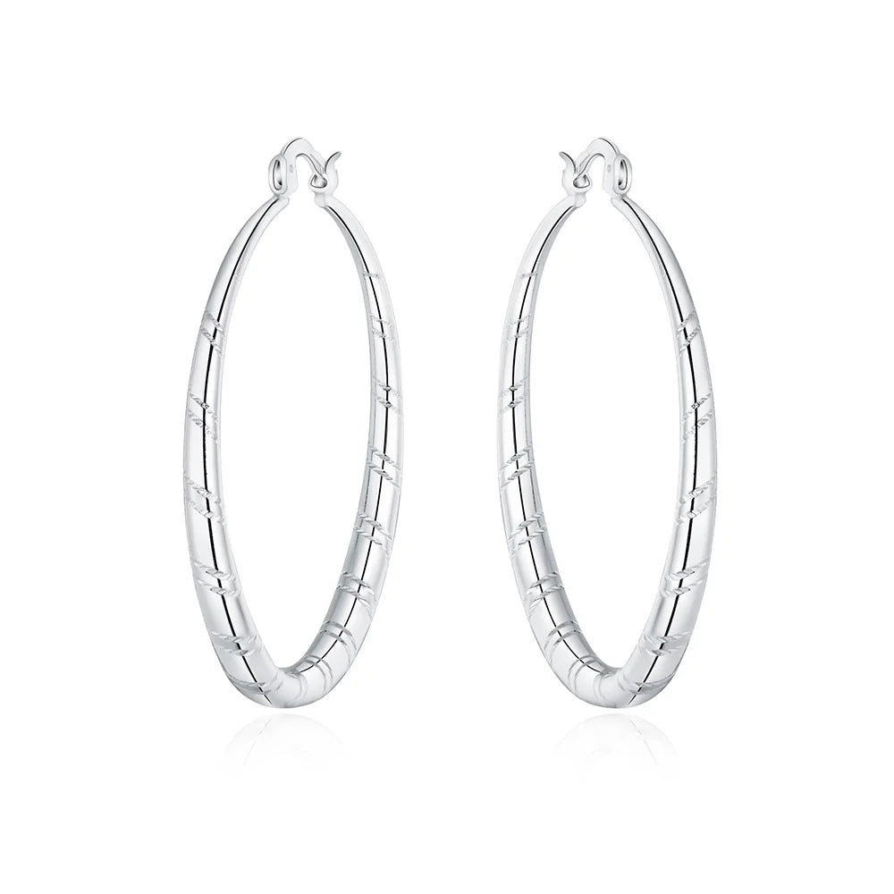 Engraved Sterling Silver Hoop Earrings – Polished Oval Hoops for Women