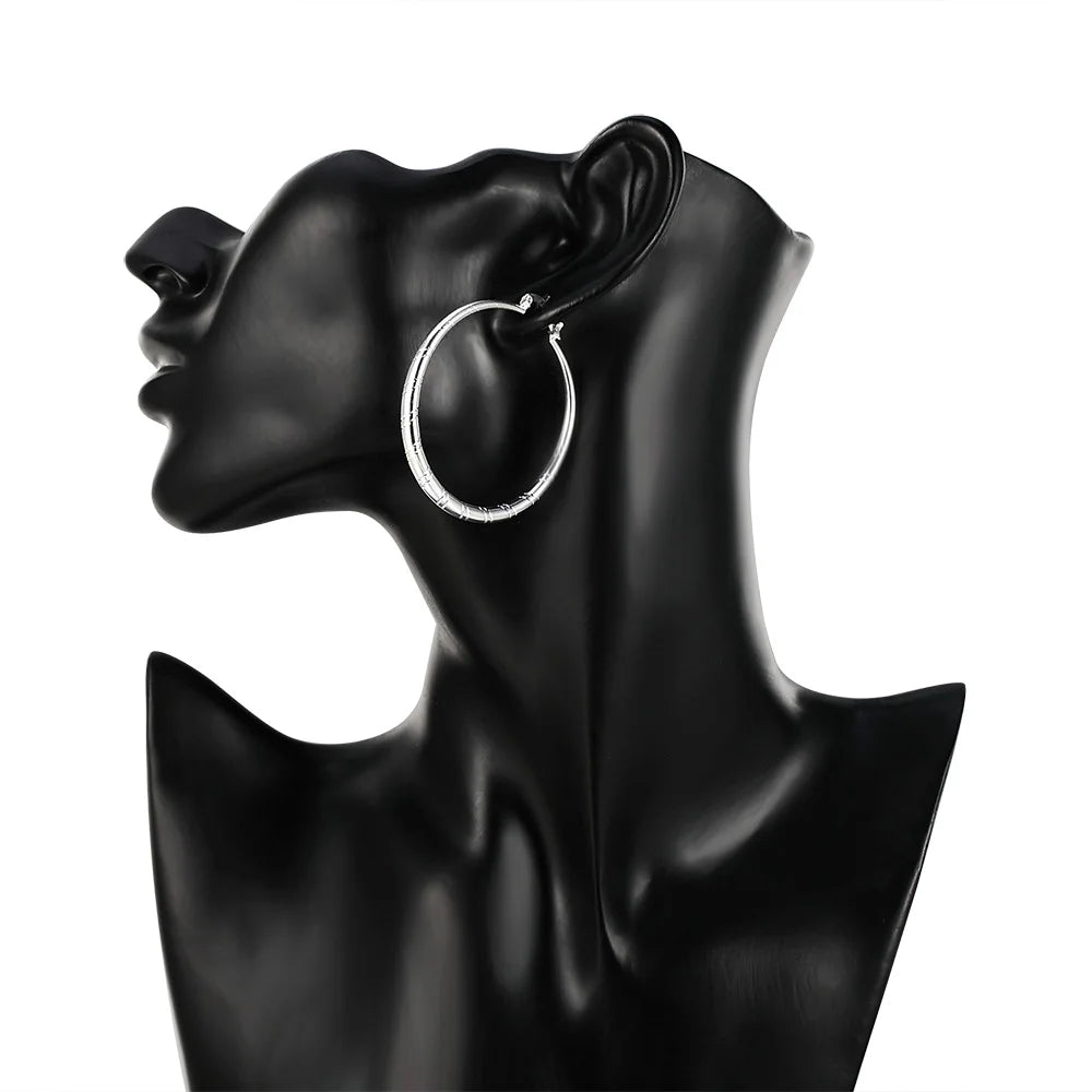 Engraved Sterling Silver Hoop Earrings – Polished Oval Hoops for Women