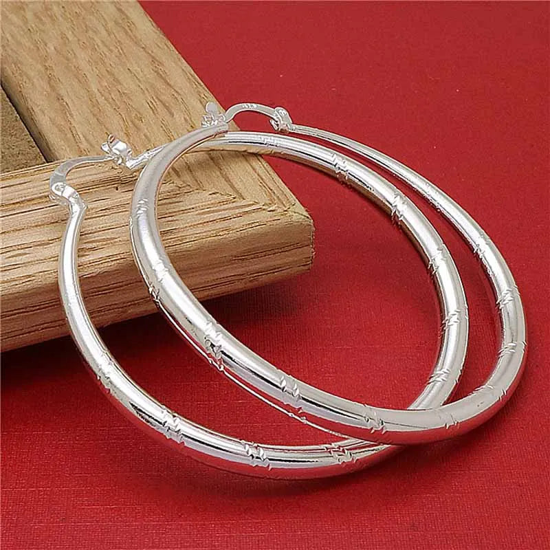 Engraved Sterling Silver Hoop Earrings – Polished Oval Hoops for Women